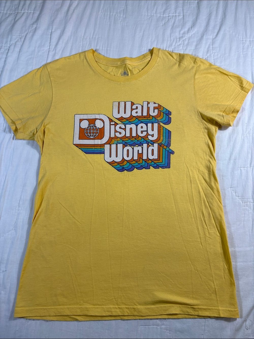 Disney Parks Walt Disney World Women’s Retro Yellow Rainbow 3D Logo Graphic Tee